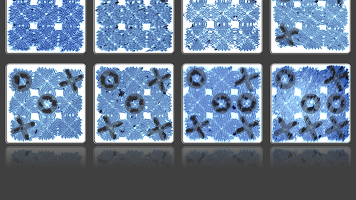 An artist's rendering of a game of tic-tac-toe played with DNA tiles