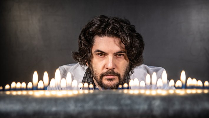 Zach Tobin in front of the Rubens' tube demo.