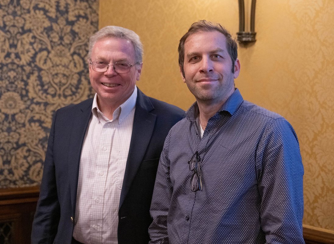 Joel Tropp stands with Provost David Tirrell