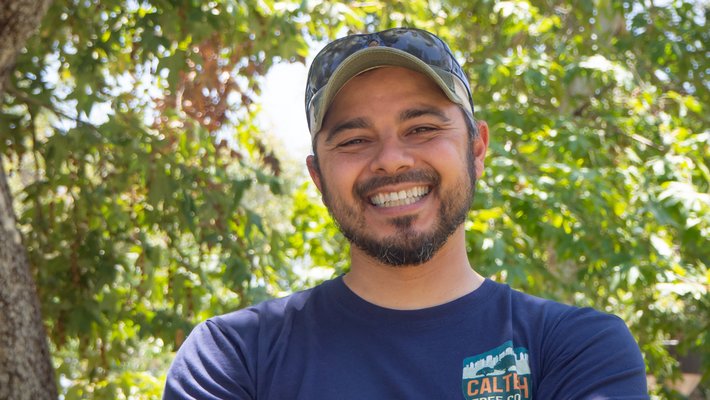 Bryan Vejar surrounded by trees