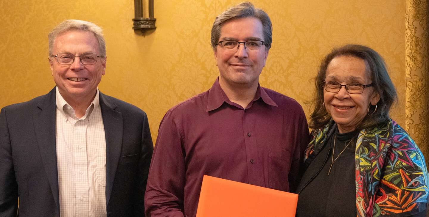 Mike Vicic stands between David Tirrell on the left and Shirley Malcom on the right.