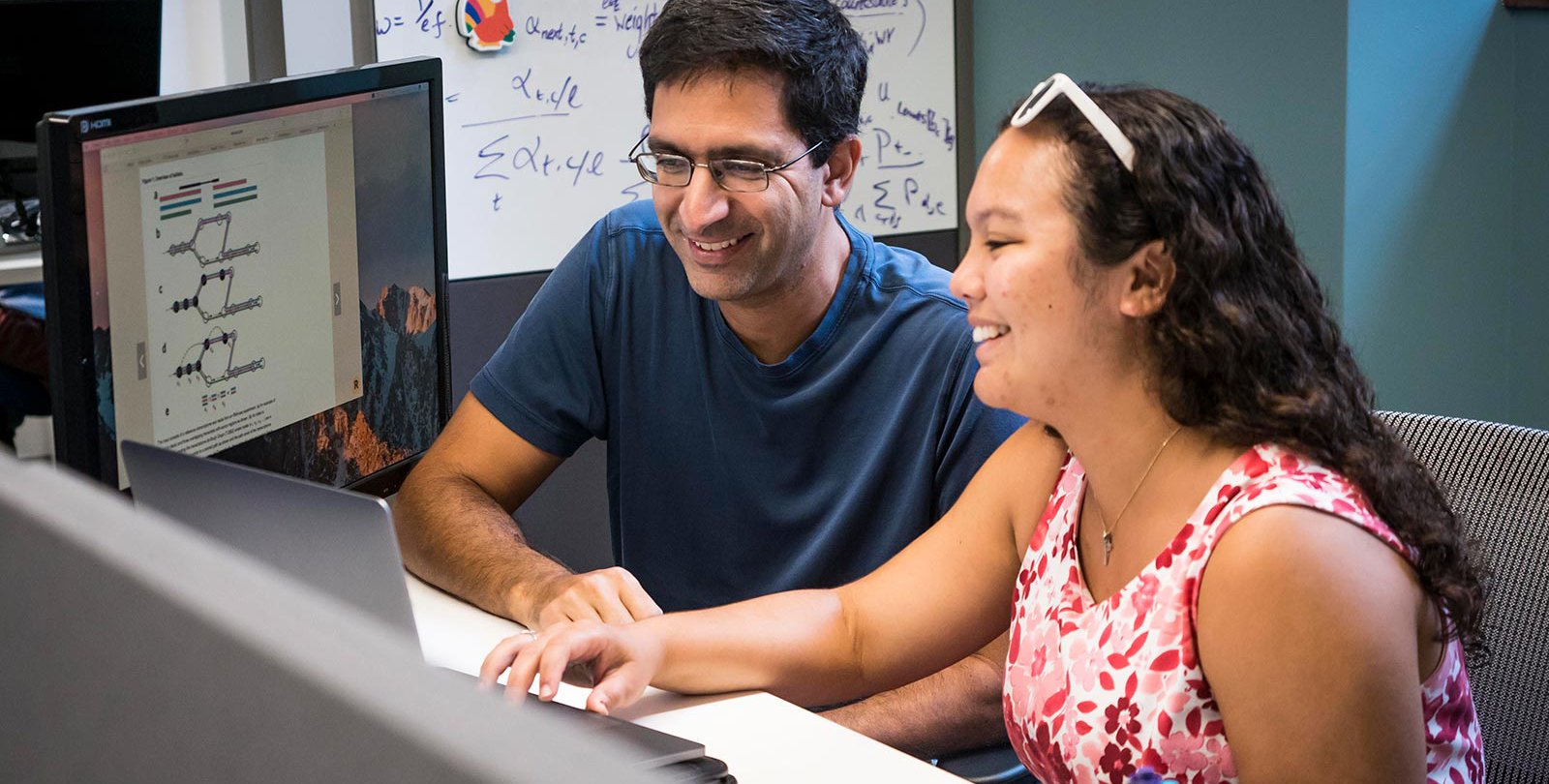 Graduate student Rebekah Loving with Bren Professor of Computational Biology and Computing and Mathematical Sciences Lior Pachter