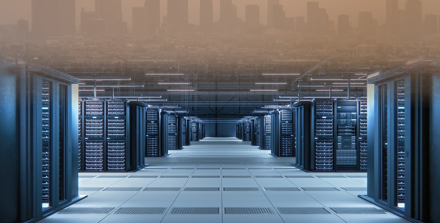 A photo of a data center at the bottom of the screen bleeds into a smoggy image of Los Angeles at the top.