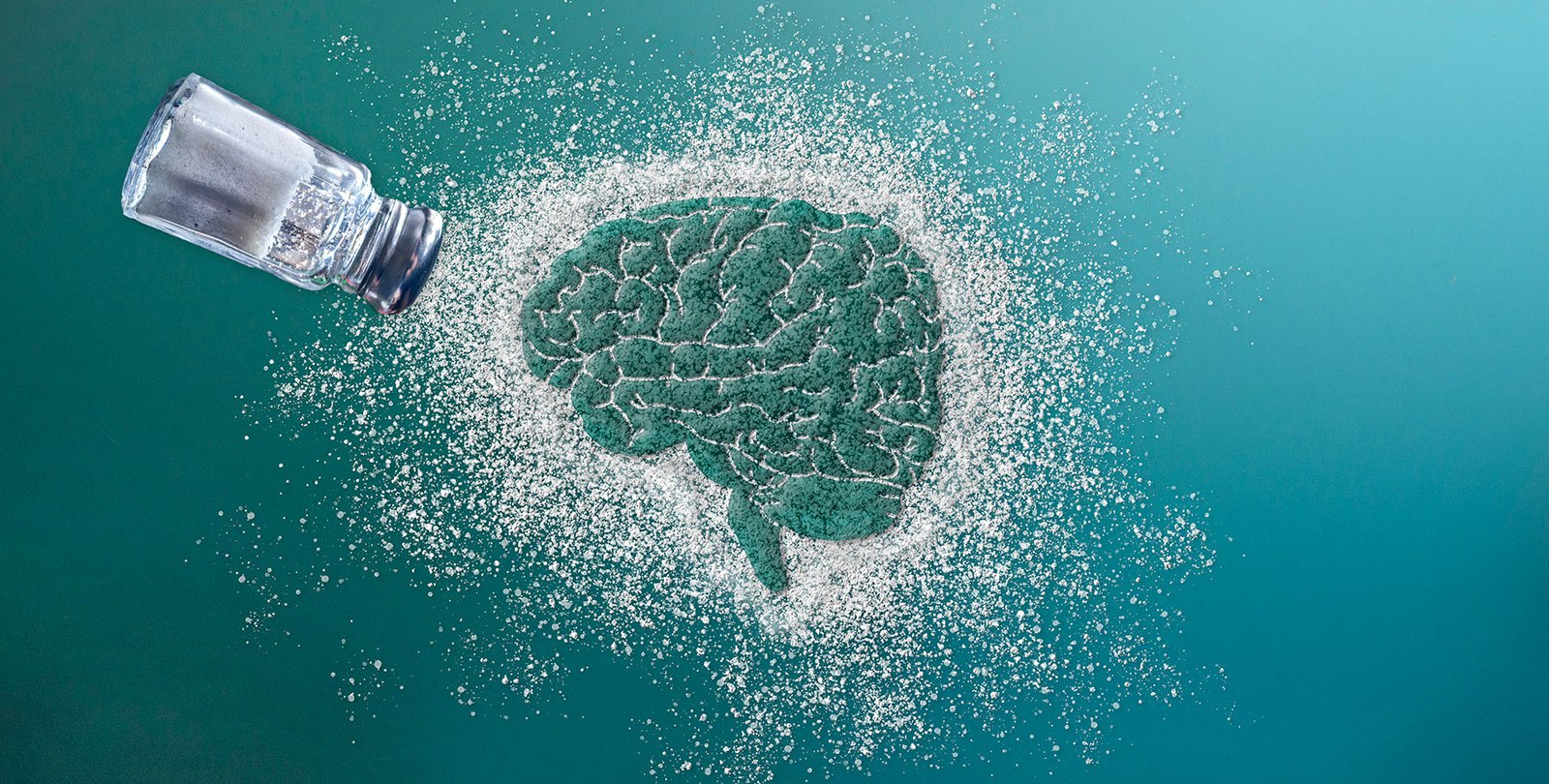 An illustration of salt and a brain.