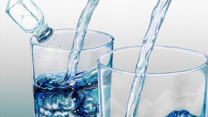 Two glasses of water, one with salt (representing electrolytes) in it