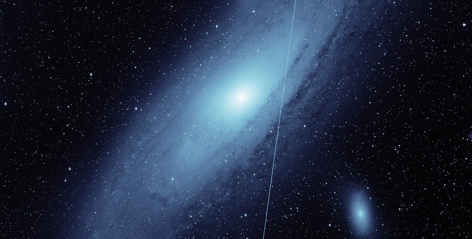 ZTF image of Andromeda galaxy with a Starlink streak through it.