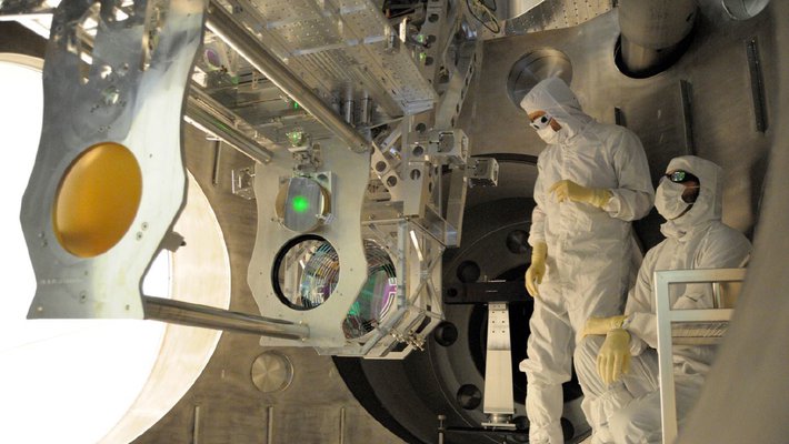 Engineers installing Advanced LIGO upgrades.