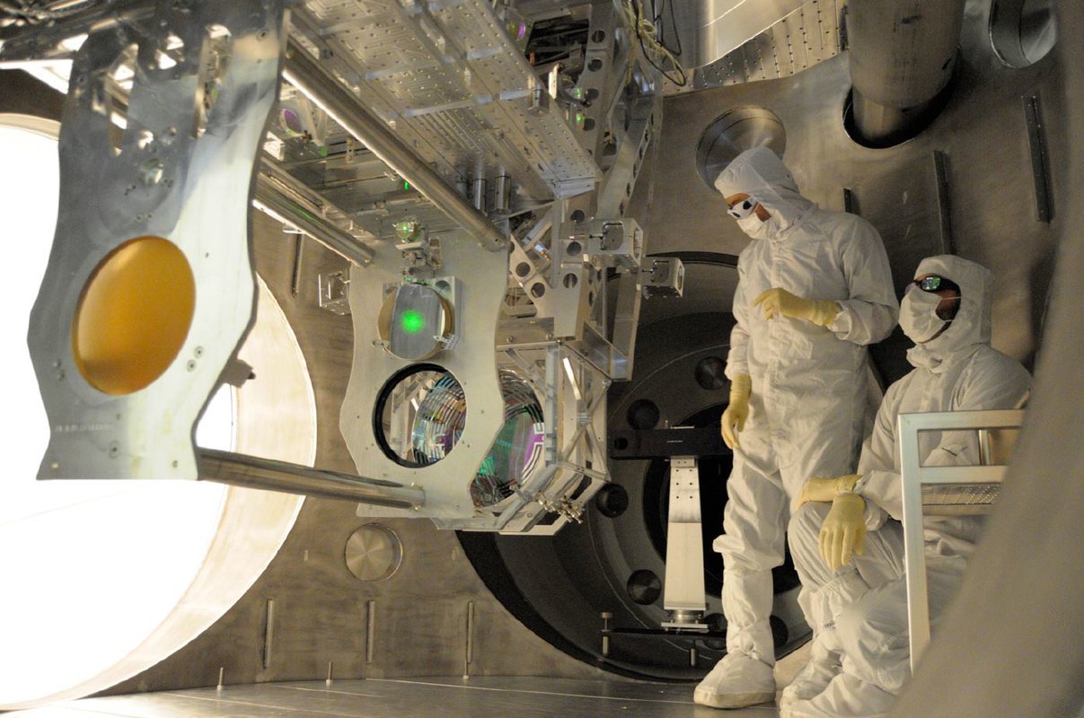 Engineers installing Advanced LIGO upgrades.