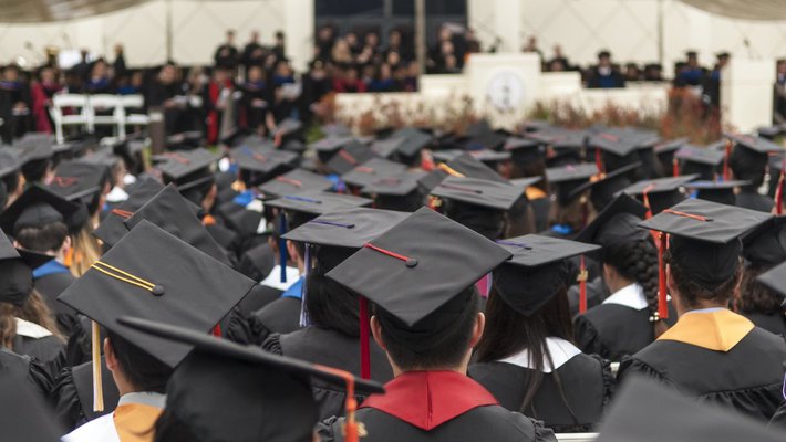 sea of graduation caps at Commencement