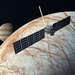 Jupiter in the background, Europa in the foreground, and rectangular shape of Clipper at front