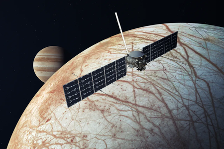 Jupiter in the background, Europa in the foreground, and rectangular shape of Clipper at front