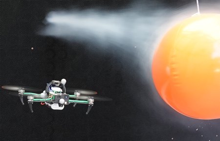 A quad-rotor shown avoiding an orange hovering ball that seems to have been blown by a wind current.