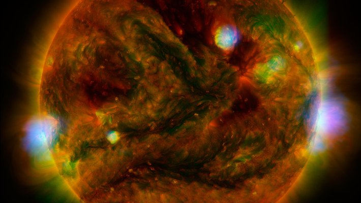 An image of the sun in several different colors