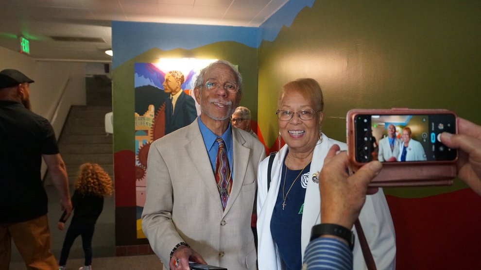 Grant D. Venerable II poses for a photo with extended family member Amelia Crawford.