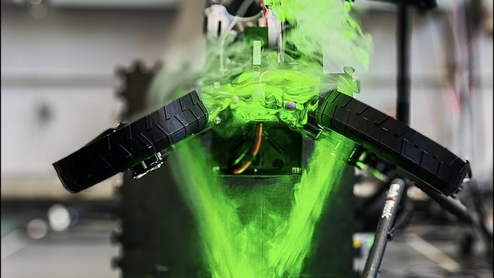 Green smoke on and around morphing drone thrusters