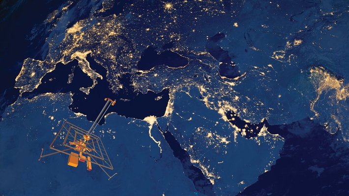 Illustration of the Earth at night with the SSPP demonstrator spacecraft