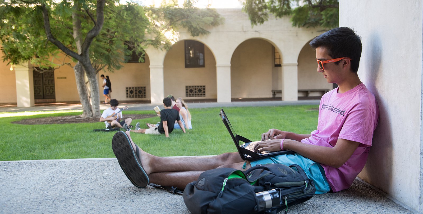 student sitting outside at Caltech