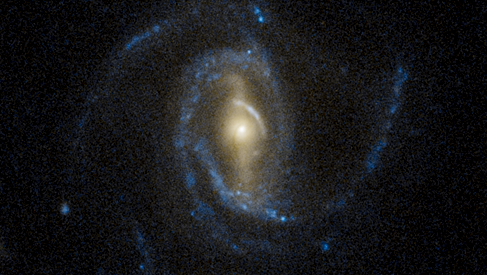 A super spiral galaxy captured by the Hubble Space Telescope.